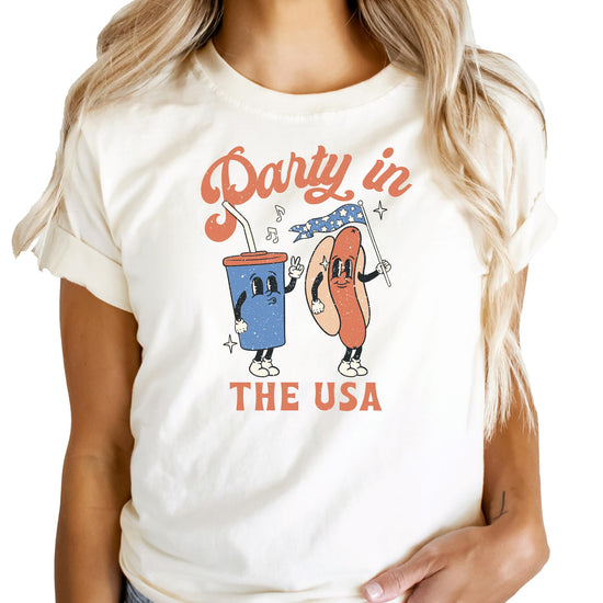 Family wearing matching Party in the USA 4th of July shirts in different colors