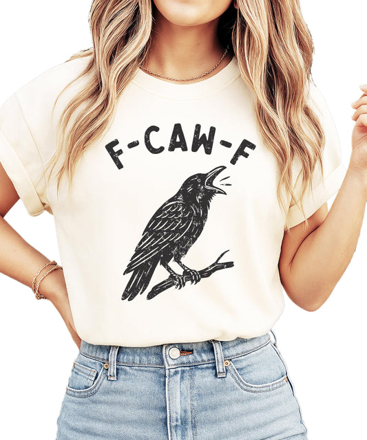 Front view of F-Caw-F funny crow Halloween shirt in seafoam green on adult model