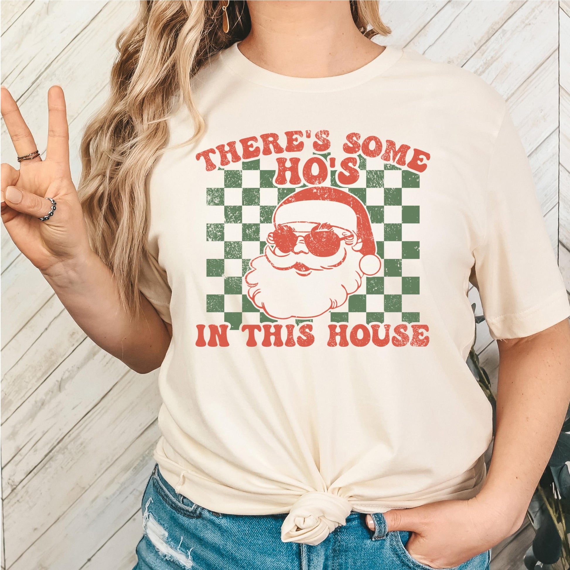 There's Some Ho's in This House Christmas shirt laid flat showing full front graphic design