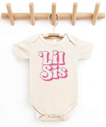 Lil Sis newborn bodysuit displayed as a baby shower gift option for little sister announcement