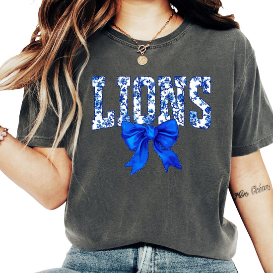 Lions floral tee shirt product styling shot on neutral background