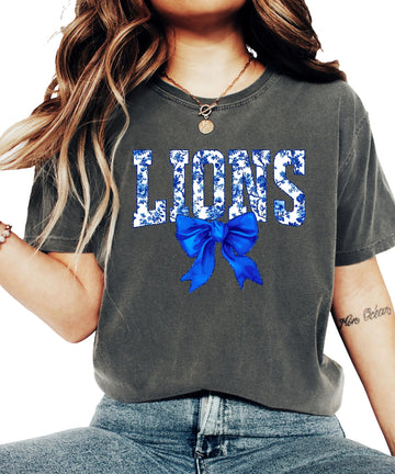 Lions floral tee shirt product styling shot on neutral background
