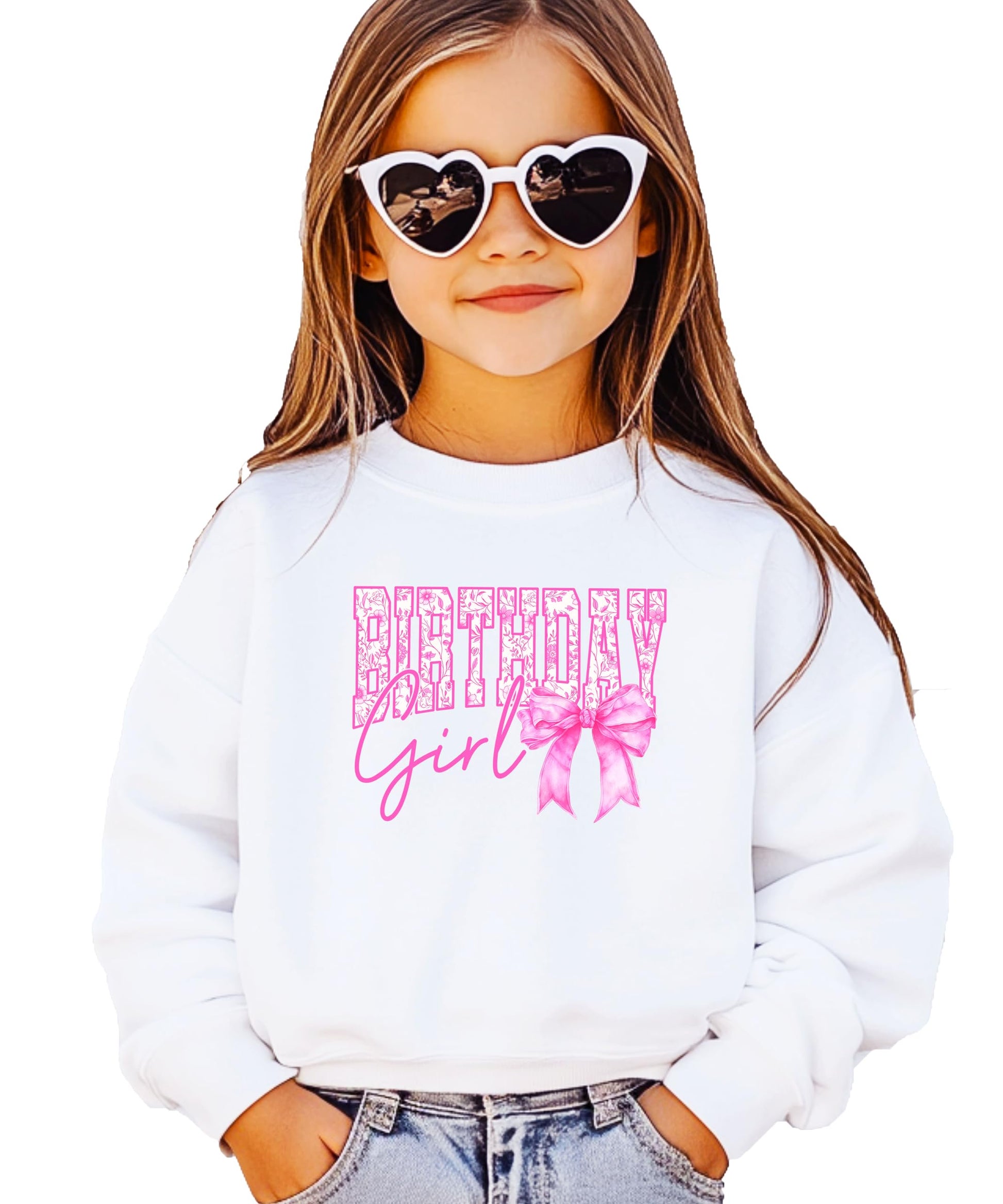 Youth girl wearing Birthday Girl pink bow pullover sweatshirt in party setting