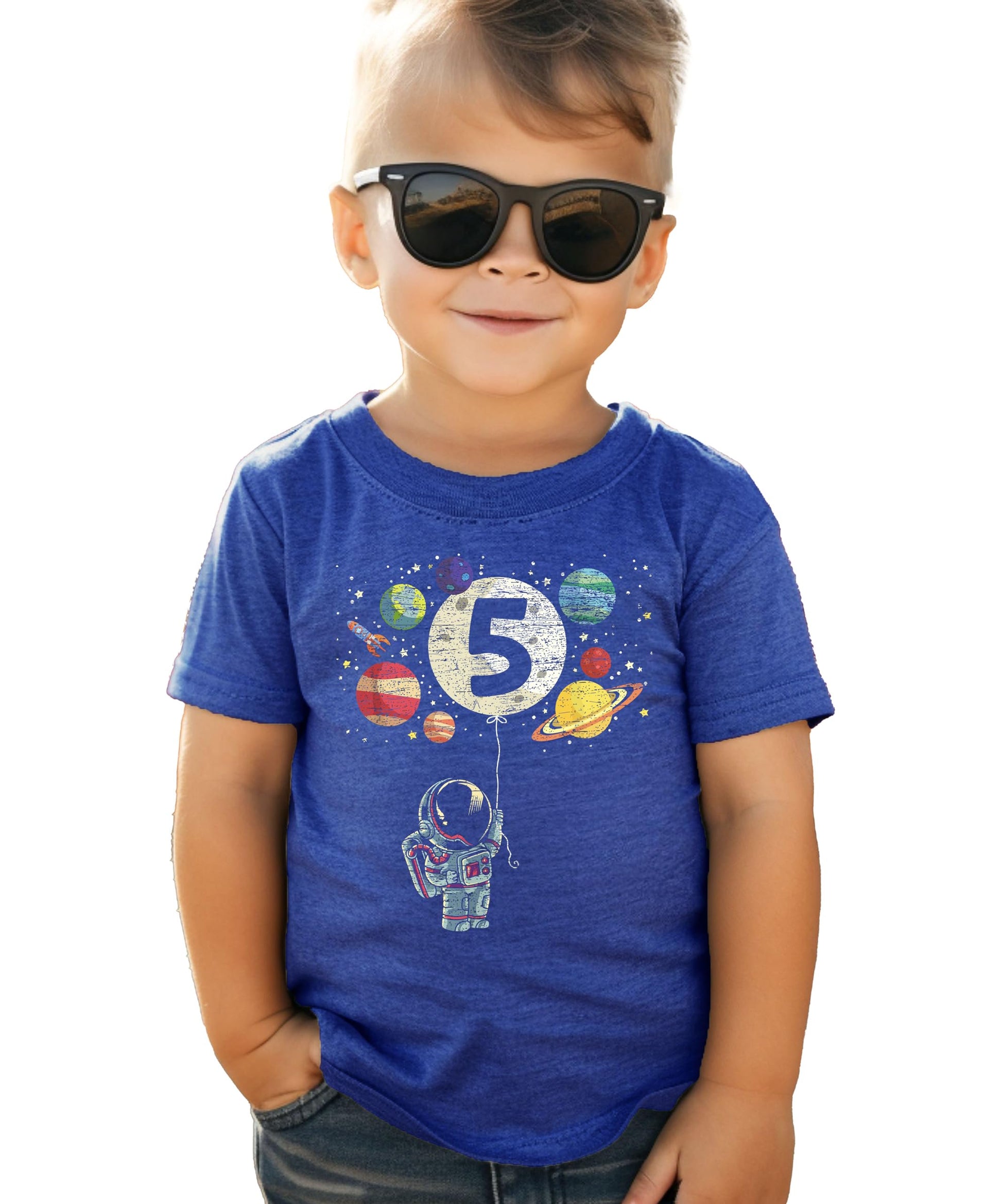 Detail shot of outer space birthday graphic tee print quality on royal blue youth shirt