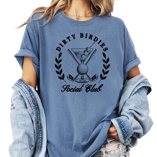 Model wearing Dirty Birdies Social Club ivory graphic tee – casual preppy golf style