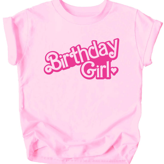 Close-up of doll themed birthday girl shirt print on purple kids tee