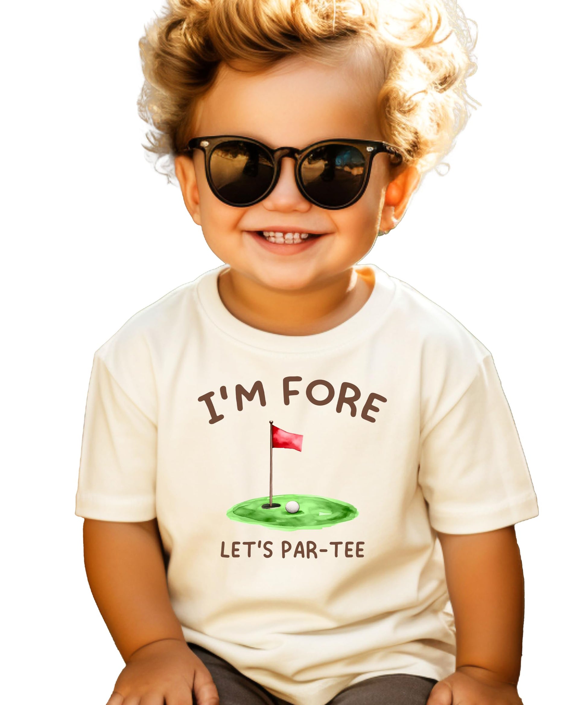 Toddler golf birthday shirt laid flat showing full front graphic and natural fabric color