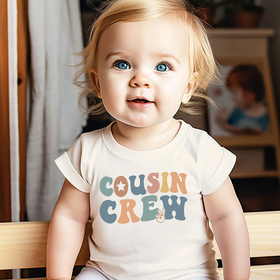 Kids wearing matching Cousin Crew shirts showing family reunion style