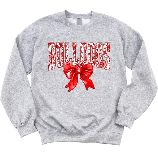Close-up view of red bow Bulldogs graphic design on sweatshirt