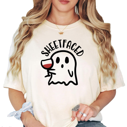 Front view of Sheetfaced funny women's Halloween tee featuring wine ghost graphic on ivory shirt