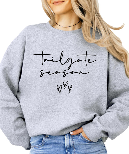 Close-up of tailgating season heart graphic print on sweatshirt