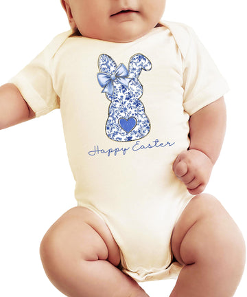 Infant modeling the Happy Easter chinoiserie bunny bodysuit in a spring setting