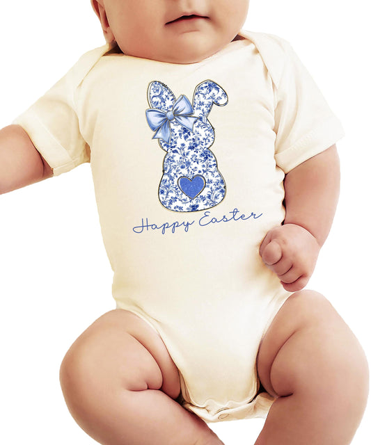 Infant modeling the Happy Easter chinoiserie bunny bodysuit in a spring setting
