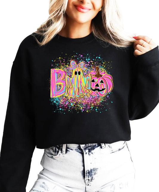 Close-up of neon BOO graphic sweatshirt showing ghost with bow and pumpkin design detail