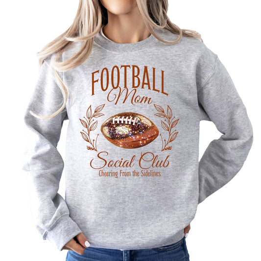 Front view of Football Mom Social Club gray sweatshirt with faux glitter football design