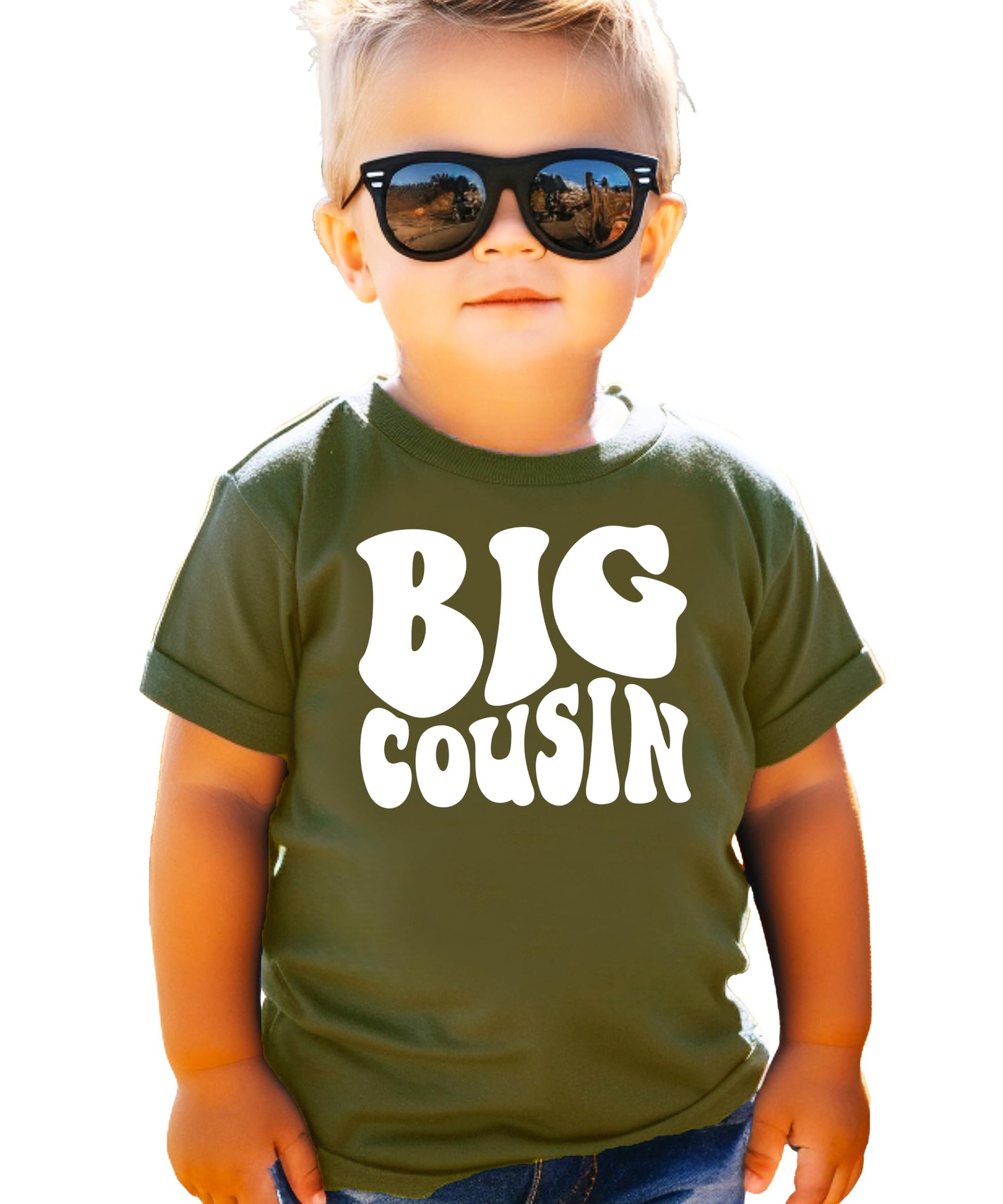 Big Cousin youth graphic tee shown from the back on military green shirt