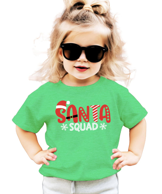 Santa Squad kids Christmas shirt flat lay showing white graphic design on mauve fabric