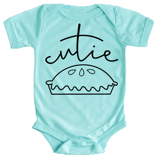 Close-up of Cutie Pie print on blue baby bodysuit showing print quality