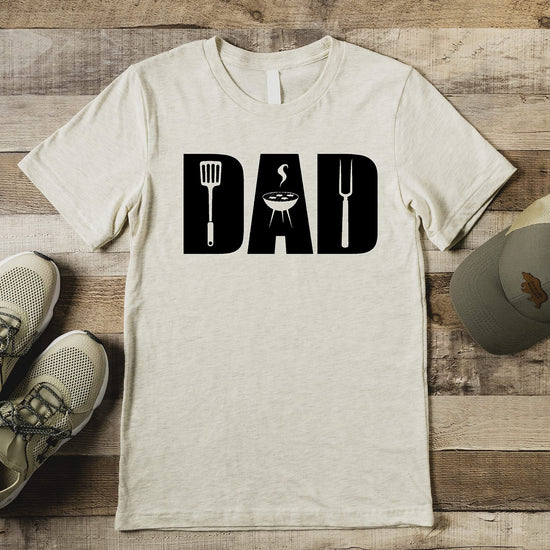 Dad grilling t-shirt on model, relaxed casual fit in natural heather color