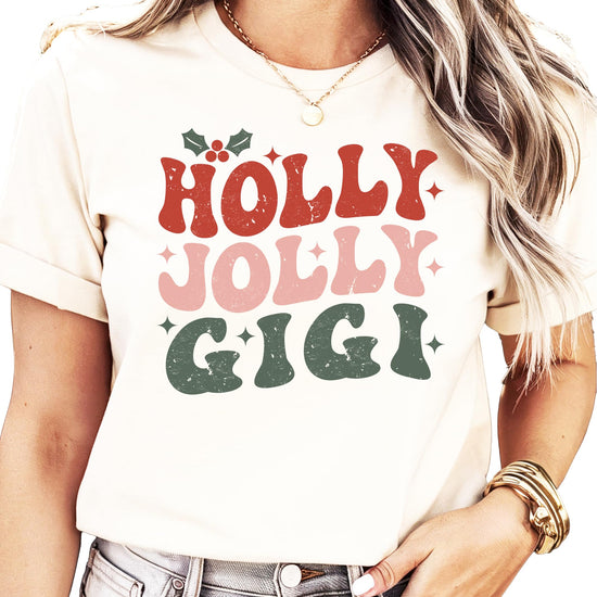 Holly Jolly Gigi women's Christmas t-shirt with retro red, pink, and green festive lettering