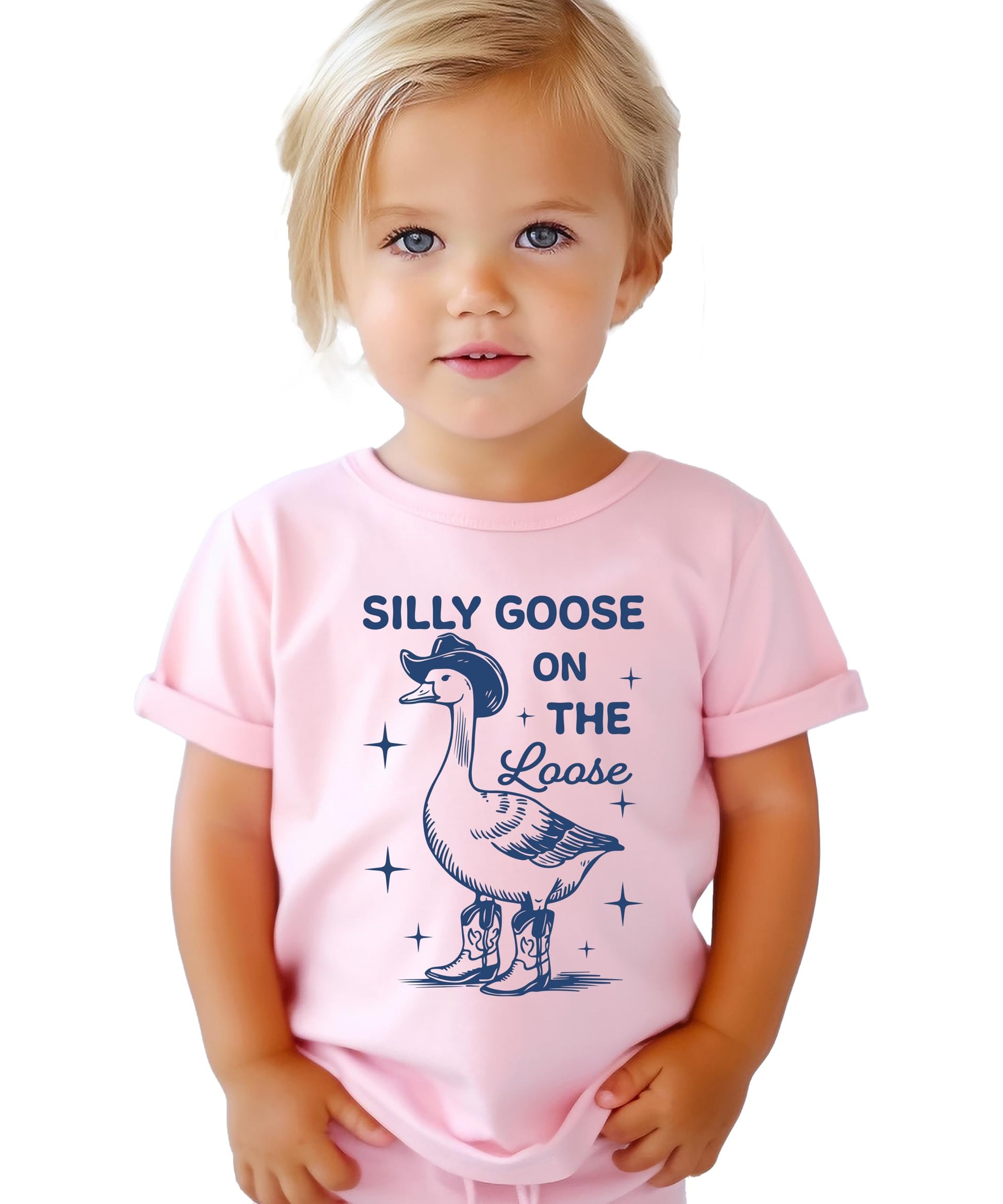Flat lay of natural colored kids t-shirt with silly goose cowboy design