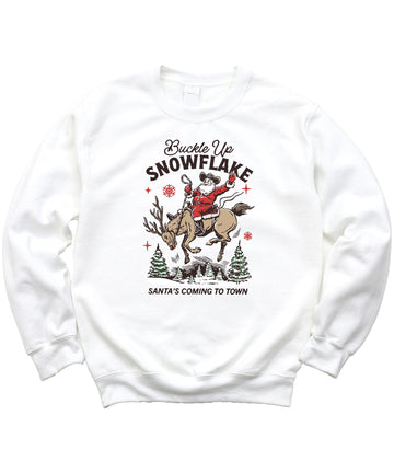 Unisex gray Christmas sweatshirt with funny cowboy Santa riding a reindeer and Buckle Up Snowflake graphic