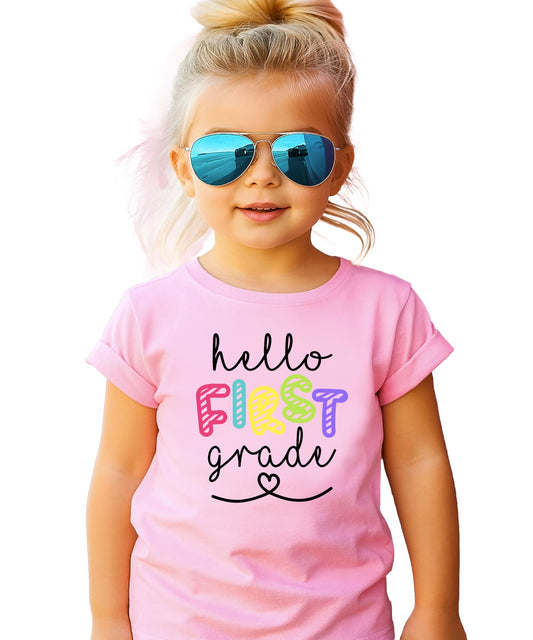 Pink kids graphic tee with Hello 1st Grade design for first day of school